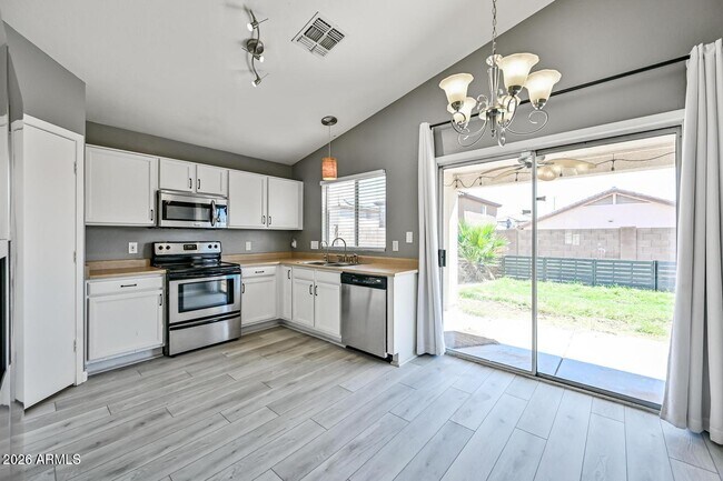 Building Photo - 12021 W Columbine Dr