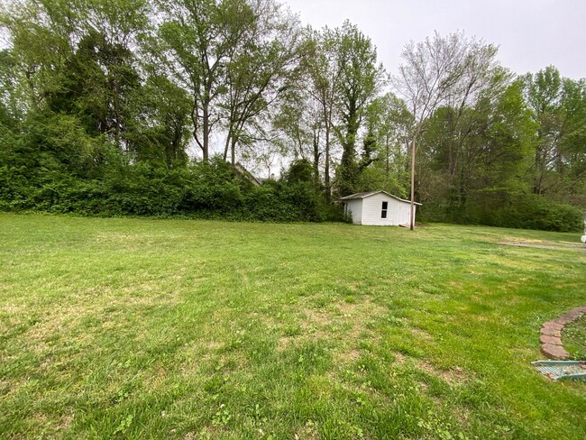 Spacious Yard with Storage - 728 Phelps and Workman Rd