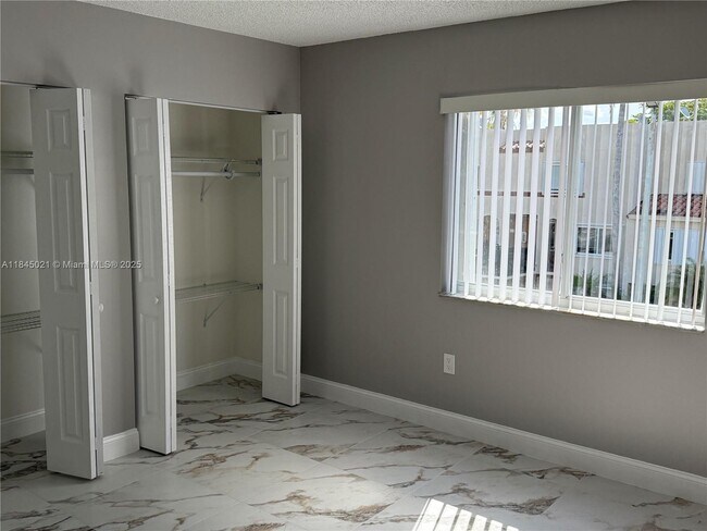 Building Photo - 551 NW 82nd Ave