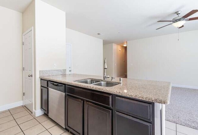 Building Photo - Four bedroom/2-bath home with 2-car garage