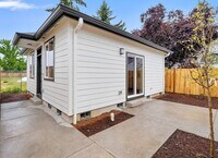 Building Photo - Brand-New Detached 2 Bedroom Home with Private Fenced Yard and Designer Finishes