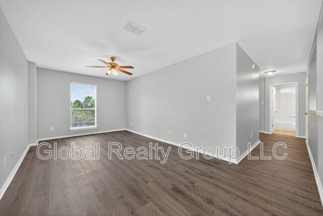 Building Photo - 10411 Artesia Wells