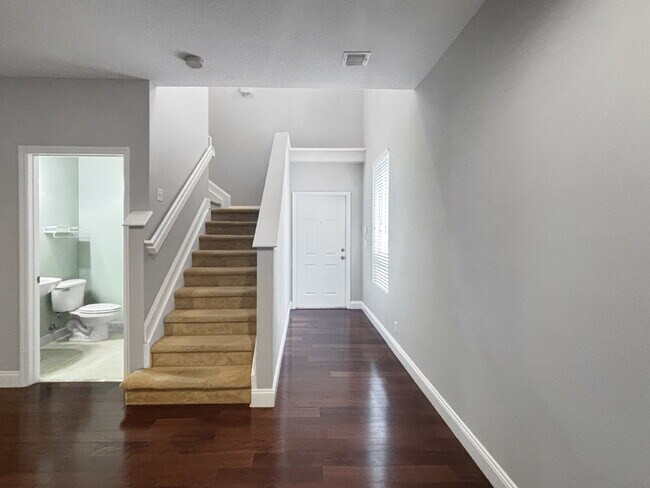 Building Photo - Spacious 3BR Townhome in Gated Villa Palma | Garage | Community Pool