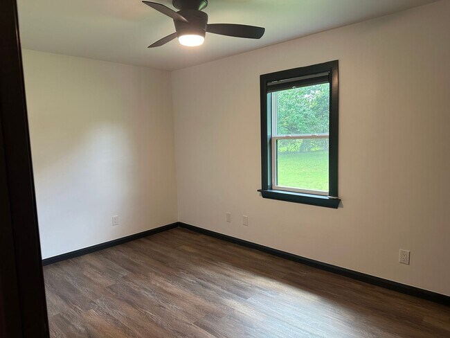 Building Photo - Welcome to country living with a fresh, modern twist.