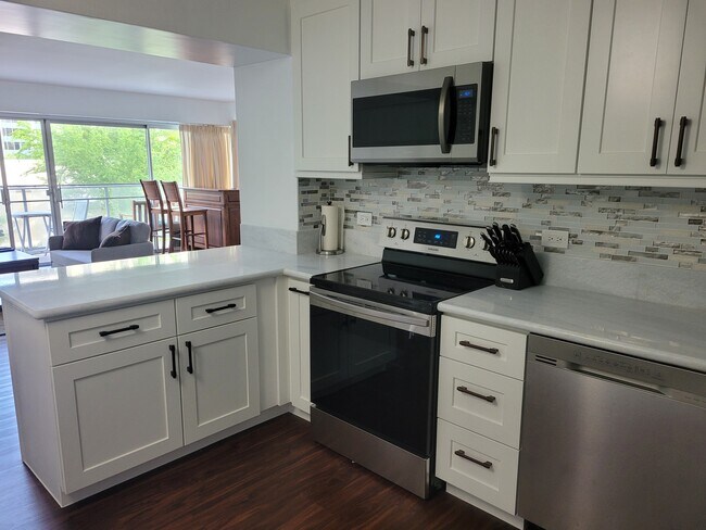New Kitchen with new appliances and granite countertops - 1645 Ala Wai Blvd