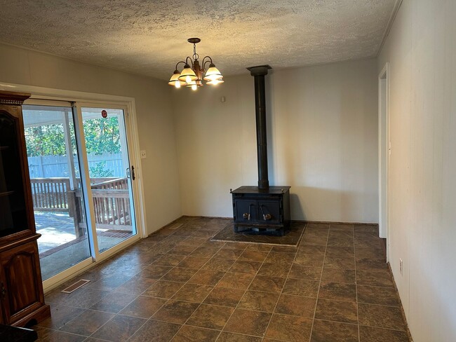 Building Photo - 4 Bedroom 1 1/2 Bath for Rent W/ Converted...