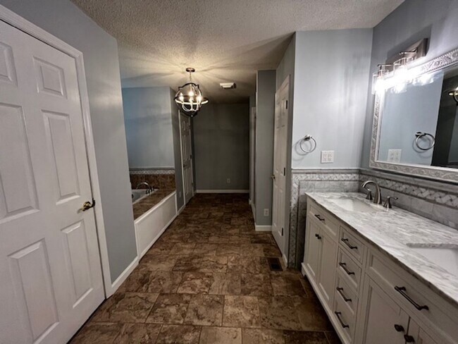 Building Photo - ***COMING SOON, JUNE 1ST*** 3 Bedroom 2 Bath house with attached garage, sun room, large back deck