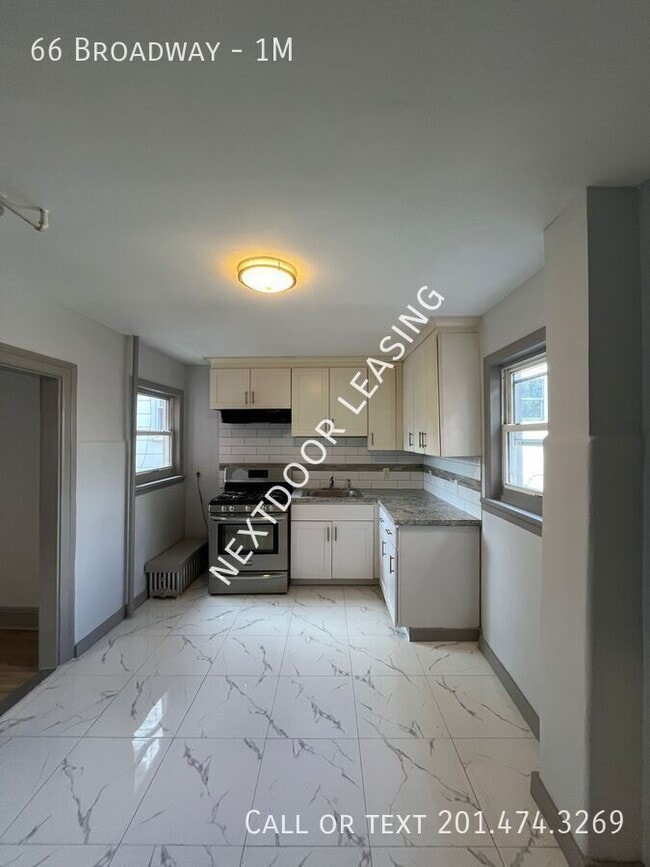 Building Photo - 66 Broadway-1M