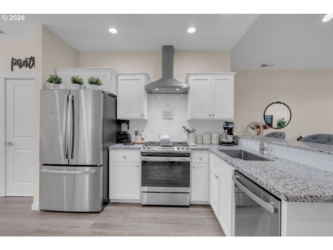 Building Photo - Bright Open-Concept Home with Vaulted Ceilings, Private Primary Suite & Stylish Modern Finishes