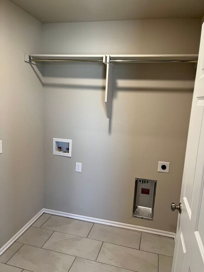 Building Photo - First Month Free! Nearly new home - built ...