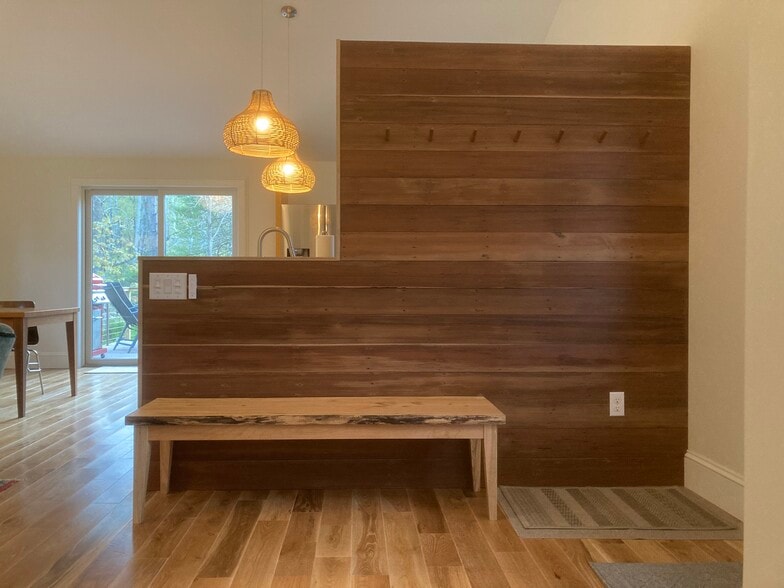Entrance - custom walnut wall - 1017 Creek Locks Rd