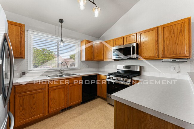 Building Photo - Spacious Home with Fenced Yard and Central AC