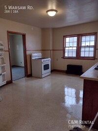 Building Photo - 2 Bedroom Upper Apartment with potential f...