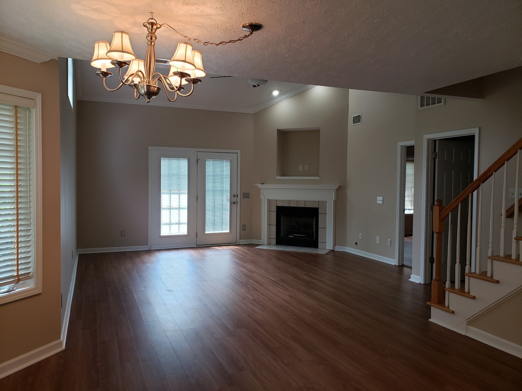 Living room with 2 story ceiling and gas fireplace - 2231 Whitney Ct