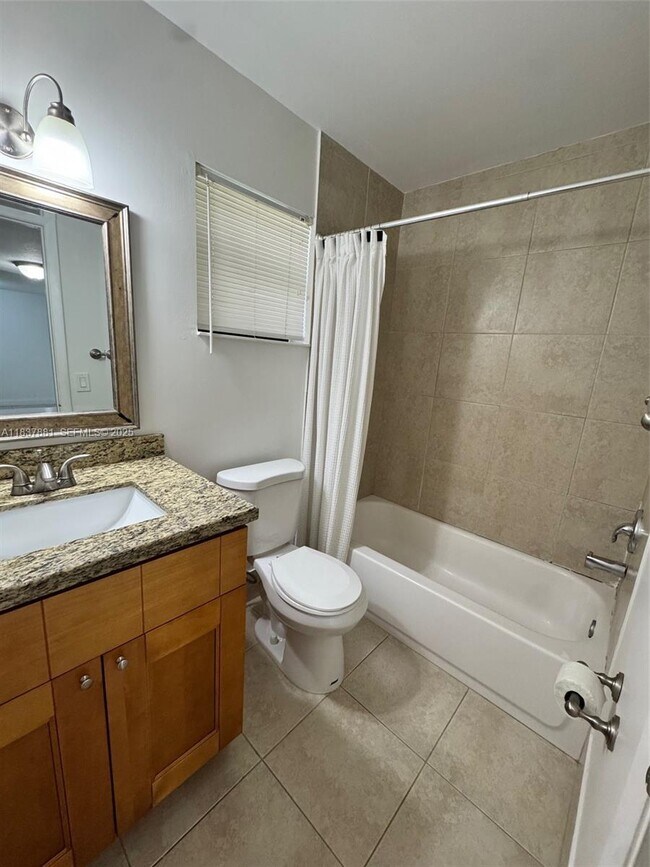 Building Photo - 3817 Cocoplum Cir