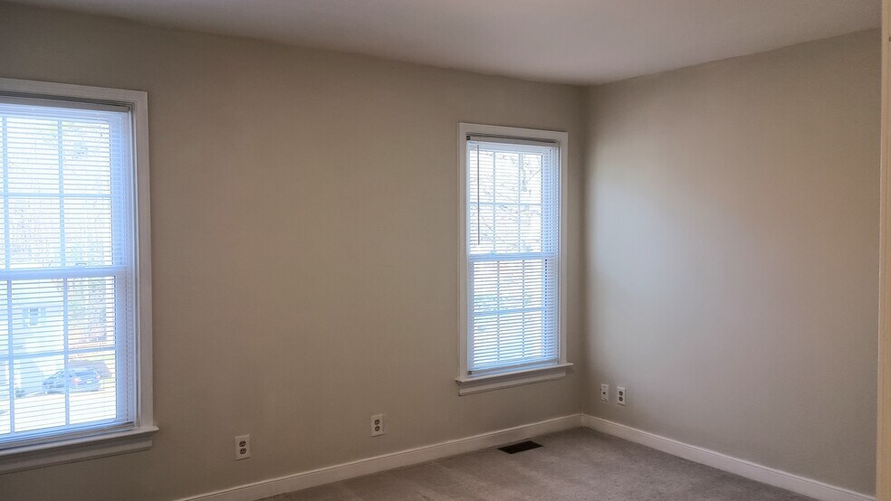 Bedroom 2 with walk up attic access - 5505 Standing Oak Pl