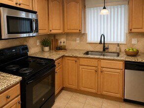 Building Photo - Updated remodeled apartment overlooking pool with 2 spacious bedrooms and 2 bathrooms