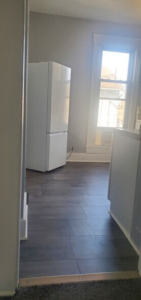 New Kitchen Floor, new cabinets & sink - 131 S 7th St