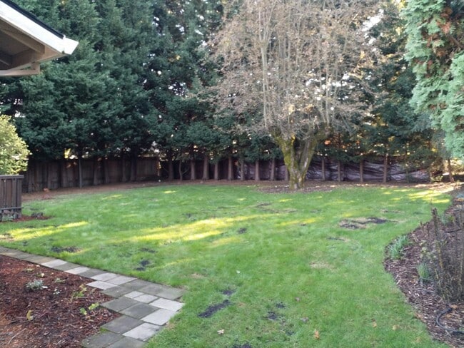 Building Photo - Charming updated 3 bed 1 bath ranch style home with double car garage and large fenced back yard.