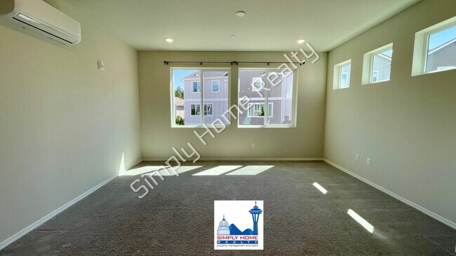 Building Photo - Step Inside to a Townhome Made for Easy Living!