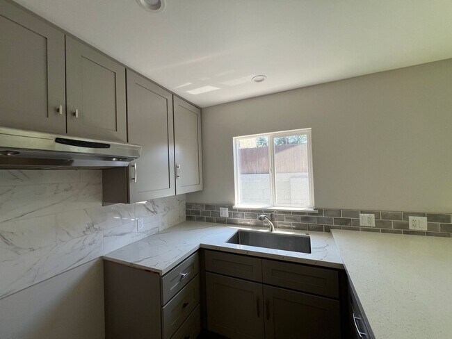 Building Photo - 51st Street Apartments Triplex