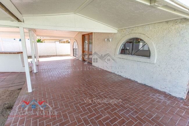 Building Photo - 8119 E Amelia Ave