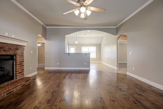 Building Photo - Spacious 4-Bedroom Home with Modern Upgrad...