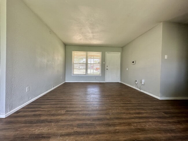 Building Photo - Updated Home with Gorgeous Floors & Large Backyard
