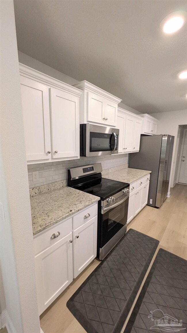 Building Photo - 5693 Old Stone Blvd