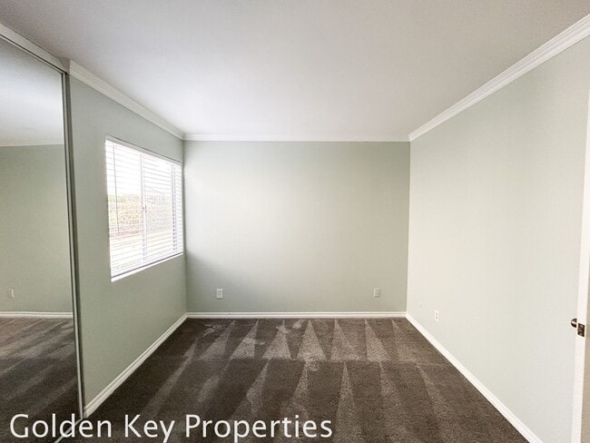 Building Photo - Welcome to this charming 2-bedroom, 2-bathroom downstairs end unit in Alta Mira in Carlsbad!!
