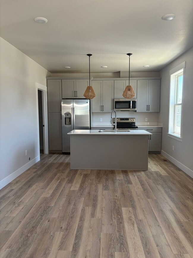 Building Photo - New construction townhome – two bed two bath with garage