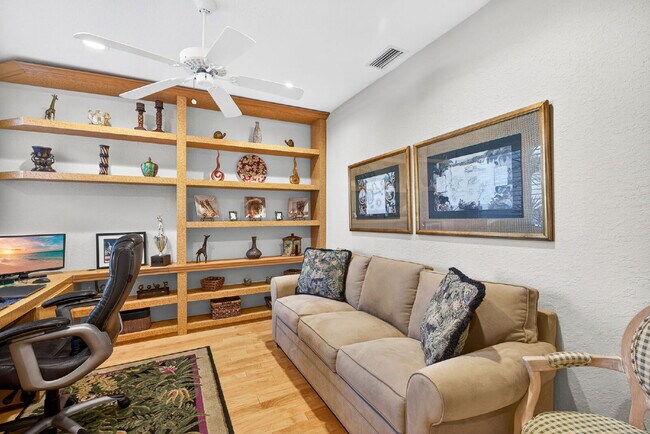 Building Photo - This 2 bedroom plus den, 2 bath condo with a one car garage offers expansive golf course and lake...