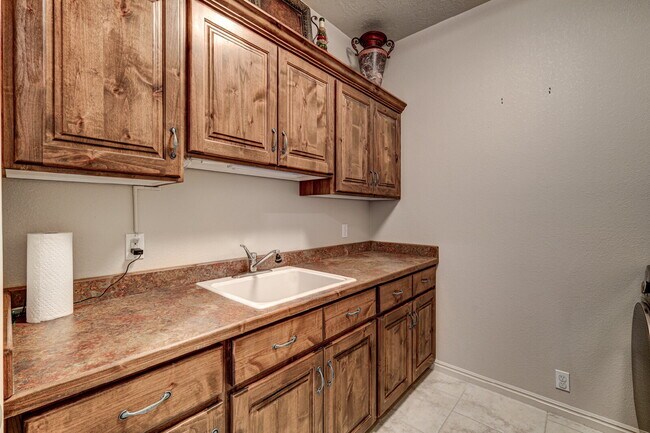 Building Photo - "Charming Fully-Furnished 1-Bed Oasis with Fireplace & Granite Touches in St. George!"