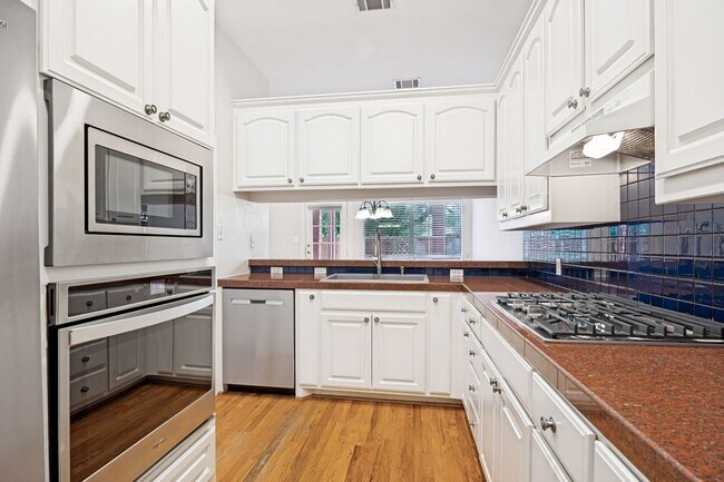 Building Photo - Sophisticated Addison Townhome with Vaulted Ceilings, Study & Two Primary Suites!