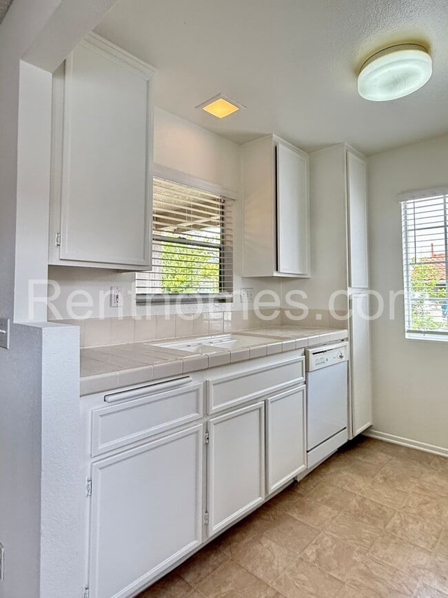 Building Photo - Mira Mesa, 10646 Aderman Avenue #18 - Minu...