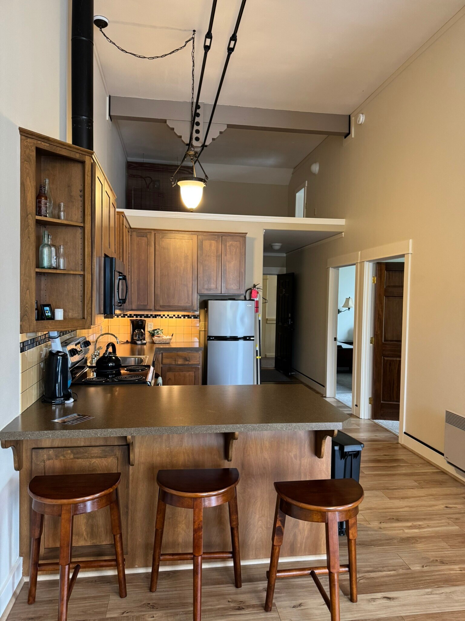 Kitchen - Bedroom doors on right. - 957 Steamboat Slough Rd