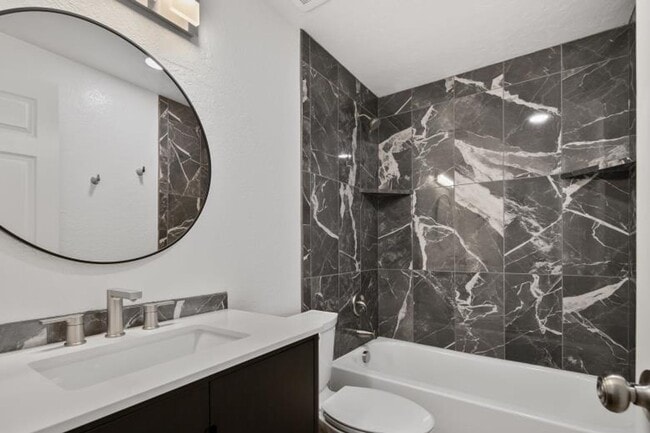 Building Photo - Completely Remodeled 3 Bedroom Duplex with...