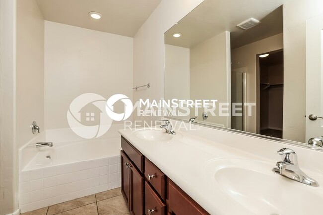 Building Photo - 8285 W Kittiwake Ln