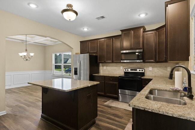 Building Photo - Spacious 5BR Home with Huge Fenced Backyard in The Reserve at Wyndham Gates!