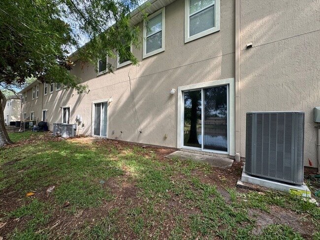 Building Photo - Available Now! Westside Timothy's Landing 2/2.5 Townhome with a 1-Car Garage