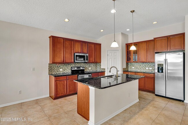 Building Photo - 16226 Magnolia Grove Way