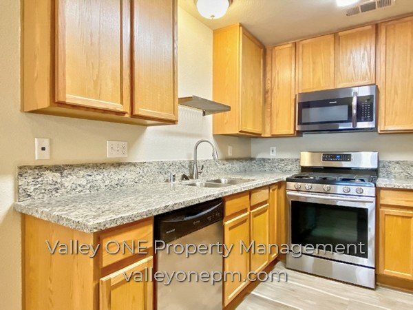 Building Photo - COMING SOON! Private Ground Floor Townhome in Desirable Complex with Attached 2 Car Garage