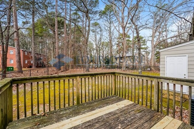 Building Photo - Charming 2-Bed / 2-Bath Duplex with Open Floor Plan & Shared Fenced Yard , Near I-40