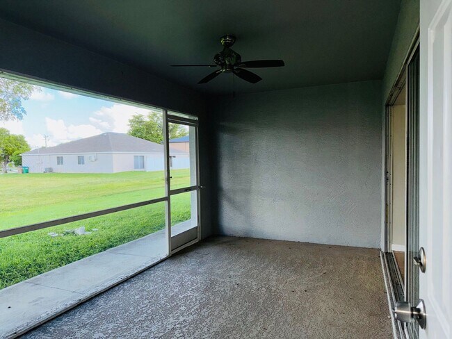 Building Photo - Experience this Cape Coral 3 bedroom 2 bath corner duplex with 1 car garage and screened in lanai.
