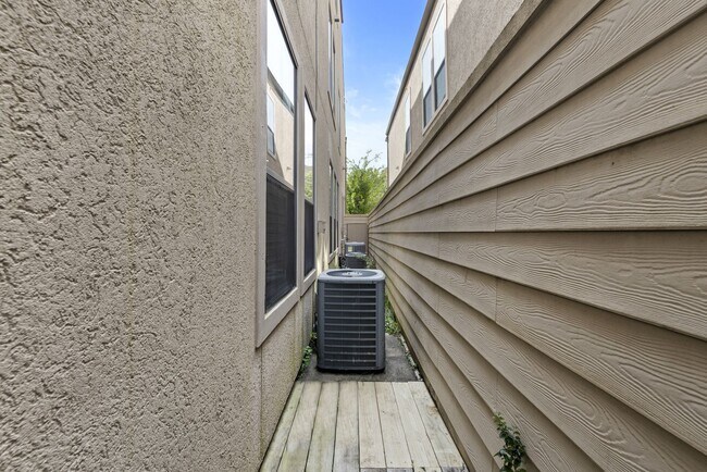 Building Photo - Luxury Townhome with Attached Garage & Outdoor Entertaining Area - $100 off first and second mont!