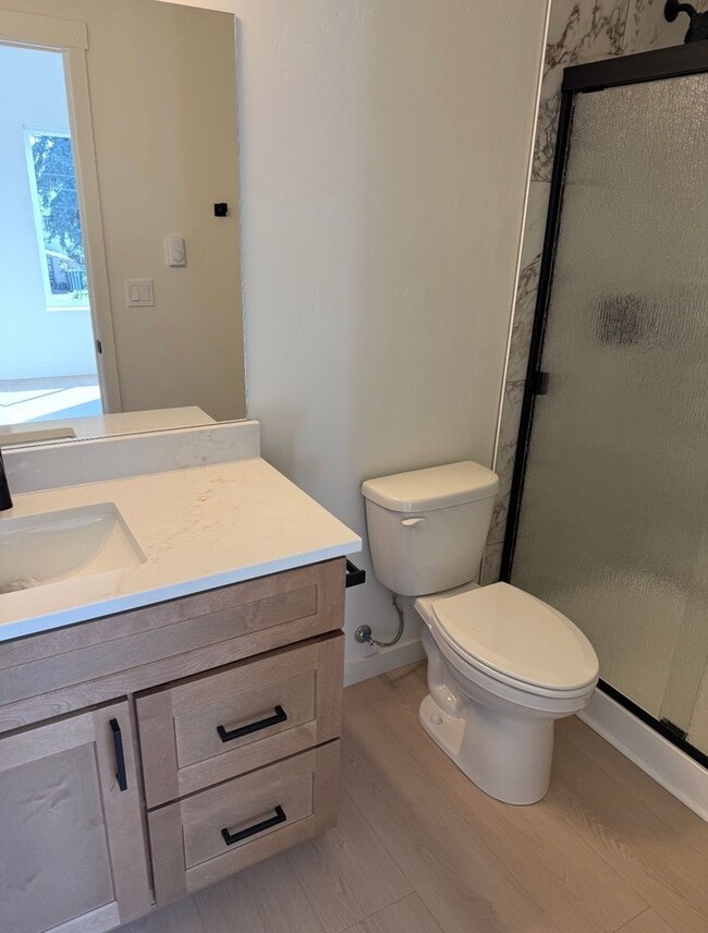 Building Photo - CDA Duplex with a 1200 sq ft Garage!