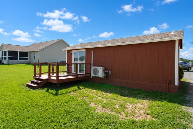 Building Photo - Brand-New Pet-Friendly Tiny Home with Utilities Included & Private Deck