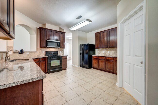 Building Photo - 7414 Compass Rose Dr