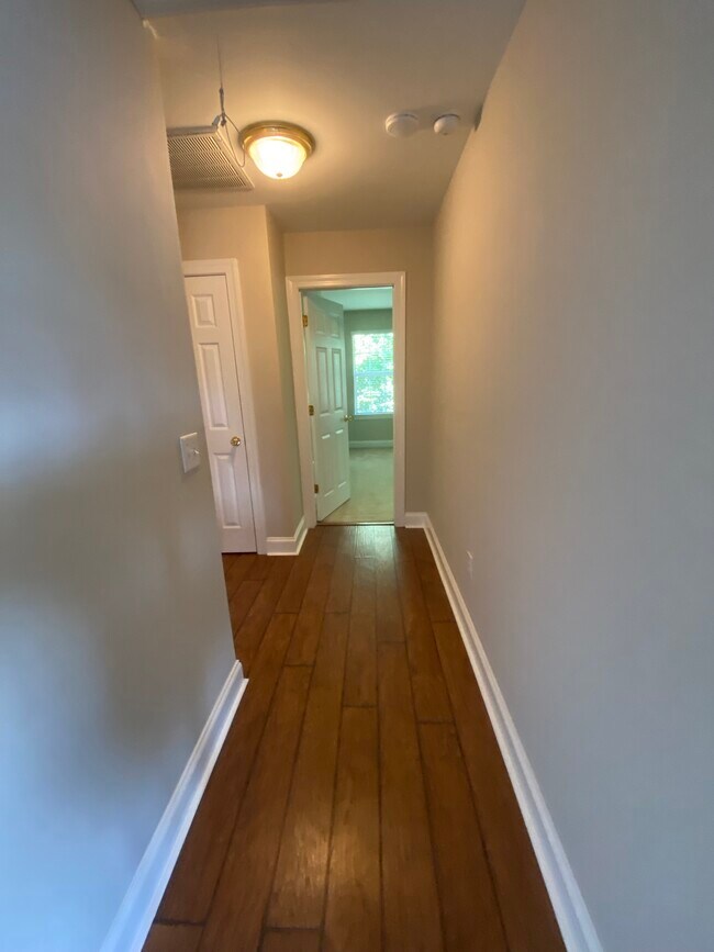 This is the hallway upstairs between the 2 bedrooms. - 137 High Ridge Rd