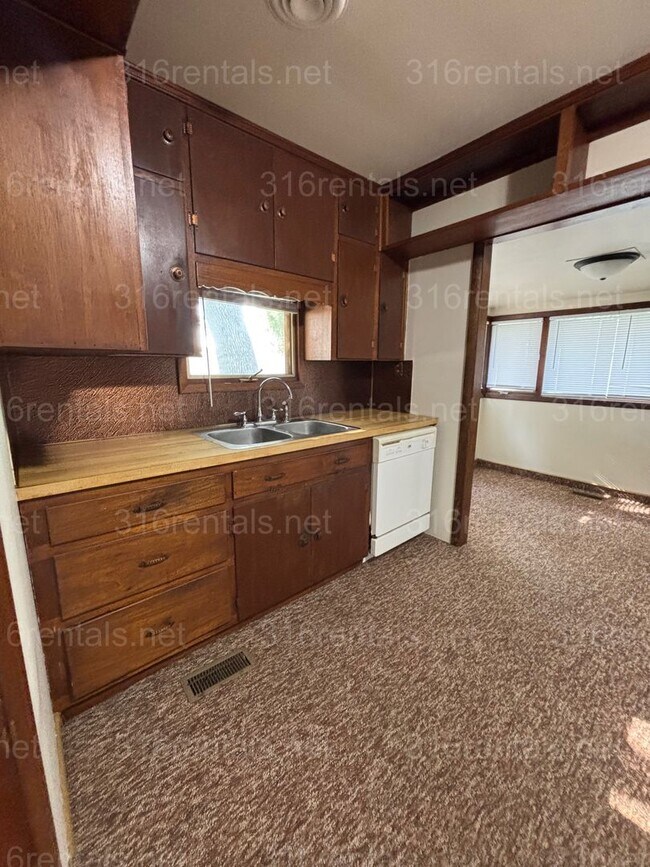 Building Photo - Two bed one bath house available now!